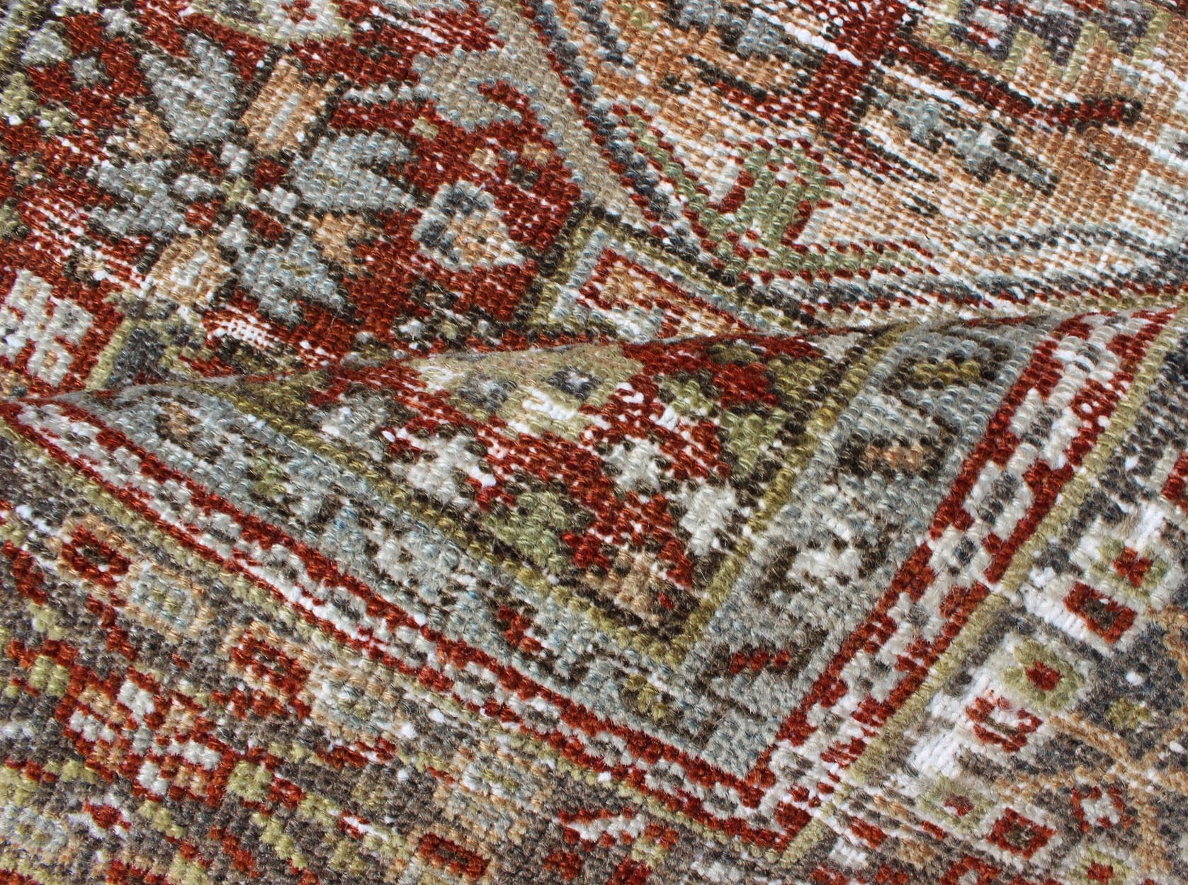 Vintage Persian Karadjeh rug with three medallion geometric tribal design, rug gng - 4749, country of origin / type: Iran / Karadjeh, circa 1930 This early 20th century, handwoven antique Persian Karadjeh rug features a red - colored field imbued wi... - Keivan Woven ArtsGNG - 4749 - 9914Rug