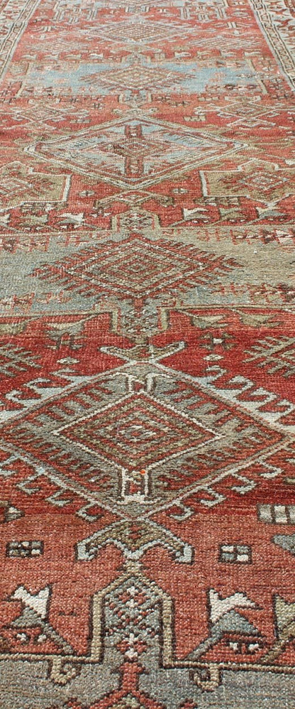 Sub - geometric Medallion design Persian Heriz antique runner in red and gray - blue tones, rug gng - 4750, country of origin / type: Iran / Heriz, circa 1920 This antique Persian Heriz runner, from northwest Iran, displays a geometric medallion desig... - Keivan Woven ArtsGNG - 4750 - 9918Rug