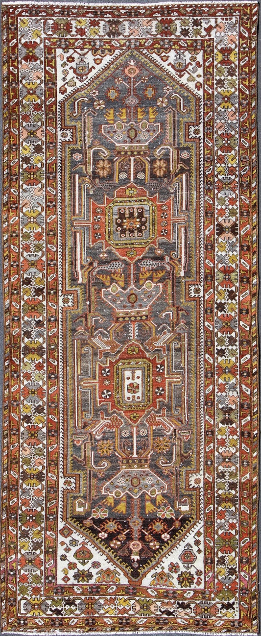 Geometric Medallion Design Vintage Persian Bakhtiari Runner in Orange, Olive, Brown, Ivory, and Gray, rug gng - 4753, country of origin / type: Iran / Bakhtiari, circa 1930 Persian Bakhtiari rugs are in fact tribal pieces that rely upon a repertoi... - Keivan Woven ArtsGNG - 4753 - 9926
