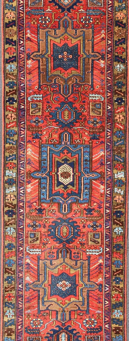 Keivan Woven Arts, Gng - 4773, Antique Heriz Karadjeh Runner with brilliant colors. This antique Karadjeh runner from 1920's displays brilliant colors is rendered in a geometric medallion design and colors such as blue, red, acid green, salmon pink, and ... - Keivan Woven ArtsGNG - 4773 - 9968Rug