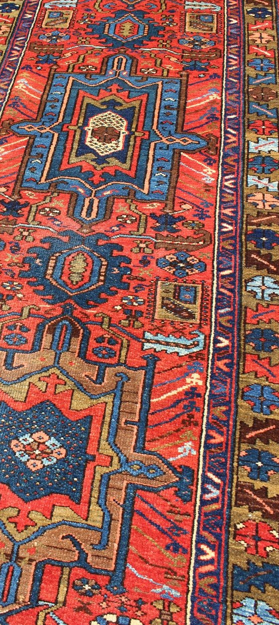 Keivan Woven Arts, Gng - 4773, Antique Heriz Karadjeh Runner with brilliant colors. This antique Karadjeh runner from 1920's displays brilliant colors is rendered in a geometric medallion design and colors such as blue, red, acid green, salmon pink, and ... - Keivan Woven ArtsGNG - 4773 - 9968Rug