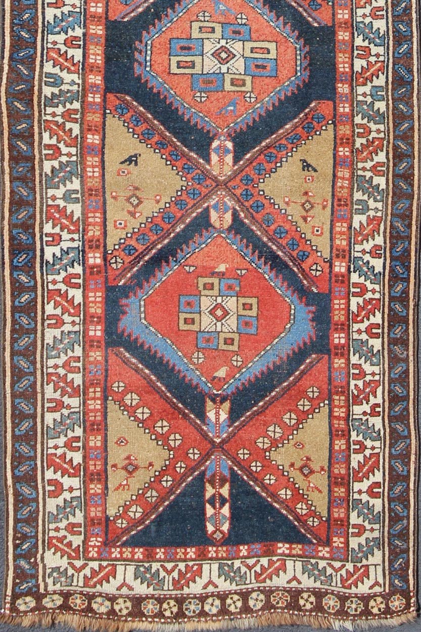 Bold Medallion Design Antique Hand Knotted Persian Heriz Runner in Red and Blue Tones Persian Heriz antique gallery rug with Sub - geometric medallion design in colorful tones, Keivan Woven Arts / rug gng - 4774, country of origin / type: Iran / Her... - Keivan Woven ArtsGNG - 4774 - 9972Rug
