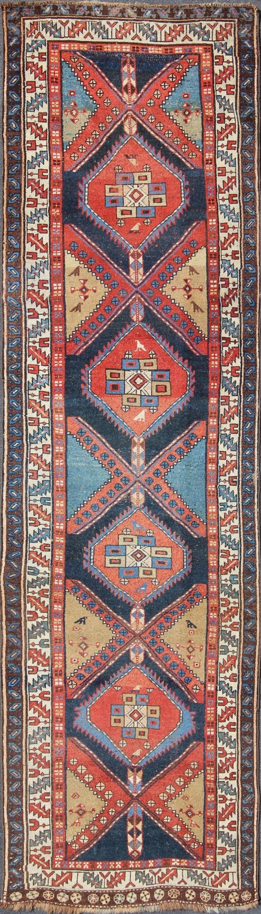 Bold Medallion Design Antique Hand Knotted Persian Heriz Runner in Red and Blue Tones Persian Heriz antique gallery rug with Sub - geometric medallion design in colorful tones, Keivan Woven Arts / rug gng - 4774, country of origin / type: Iran / Her... - Keivan Woven ArtsGNG - 4774 - 9972Rug