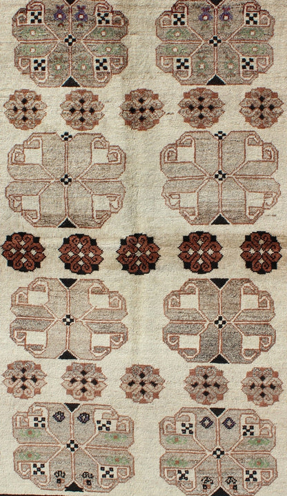 Persian Gabbeh Vintage Rug With Blossom Medallions in Brown, Ivory, Taupe, Green and Black 1950s Persian Gabbeh vintage kwarugs h - 1205 - 04, country of origin / type: Iran / Gabbeh, circa 1950 This high - pile mid - 20th century vintage Persian Gabbeh... - Keivan Woven ArtsH - 1205 - 04 - 4138Rug