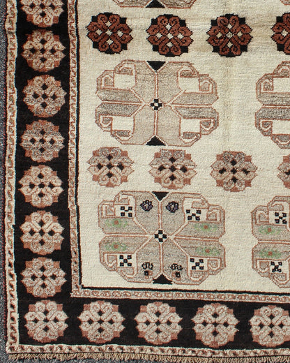 Persian Gabbeh Vintage Rug With Blossom Medallions in Brown, Ivory, Taupe, Green and Black 1950s Persian Gabbeh vintage kwarugs h - 1205 - 04, country of origin / type: Iran / Gabbeh, circa 1950 This high - pile mid - 20th century vintage Persian Gabbeh... - Keivan Woven ArtsH - 1205 - 04 - 4138Rug