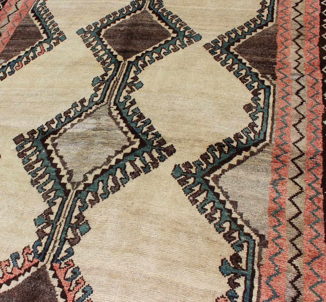 Keivan Woven Arts, H - 1205 - 06, 1950s Semi Antique Gabbeh Rug This Semi Antique Gabbeh carpet features a geometric design, including a repeating diamond design in its central field. Multiple tribal - patterned borders surround the field and frame entire... - Keivan Woven ArtsH - 1205 - 06 - 4148Rug