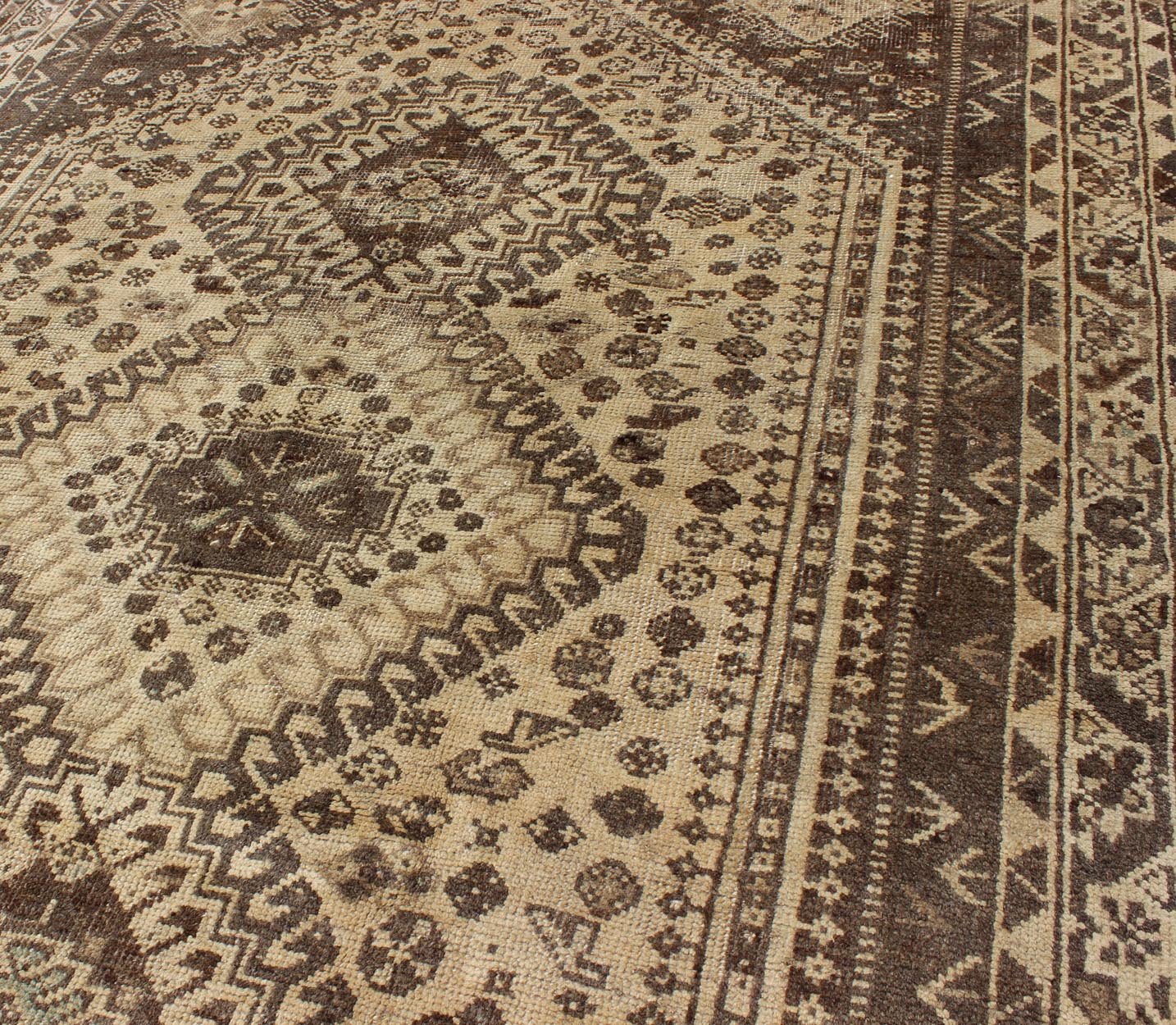 Keivan Woven Arts, H - 1211 - 40, 1950s Semi - Antique Rug Vintage Persian Shiraz with Tribal Design and Neutral Colors This vintage Persian rug features a central medallion design in a neutral color palette with brown outlines. The geometric,... - Keivan Woven ArtsH - 1211 - 40 - 3774Rug