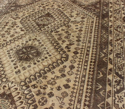 Keivan Woven Arts, H - 1211 - 40, 1950s Semi - Antique Rug Vintage Persian Shiraz with Tribal Design and Neutral Colors This vintage Persian rug features a central medallion design in a neutral color palette with brown outlines. The geometric,... - Keivan Woven ArtsH - 1211 - 40 - 3774Rug