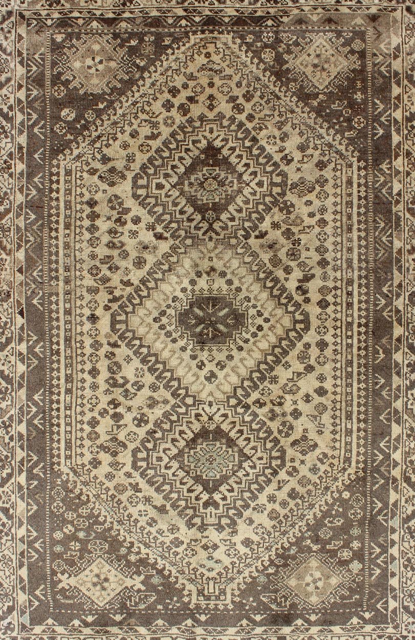 Keivan Woven Arts, H - 1211 - 40, 1950s Semi - Antique Rug Vintage Persian Shiraz with Tribal Design and Neutral Colors This vintage Persian rug features a central medallion design in a neutral color palette with brown outlines. The geometric,... - Keivan Woven ArtsH - 1211 - 40 - 3774Rug