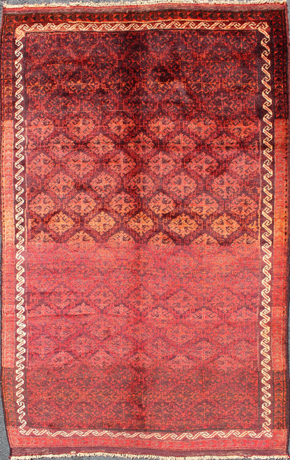 Keivan Woven Arts, H - 1211 - 48, 1950's Semi Antique Tribal Balouchi Rug. This Semi Antique Balouchi rug was woven in 1950 and features a unique all - over design of repeating diamond - shaped motifs in Red , outlined by interconnected latch - hooks. The bo... - Keivan Woven ArtsH - 1211 - 48 - 3778Rug
