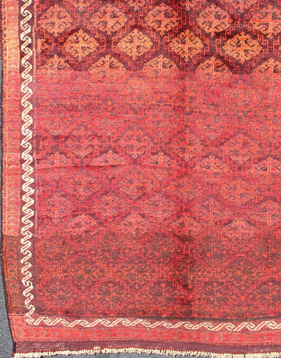 Keivan Woven Arts, H - 1211 - 48, 1950's Semi Antique Tribal Balouchi Rug. This Semi Antique Balouchi rug was woven in 1950 and features a unique all - over design of repeating diamond - shaped motifs in Red , outlined by interconnected latch - hooks. The bo... - Keivan Woven ArtsH - 1211 - 48 - 3778Rug