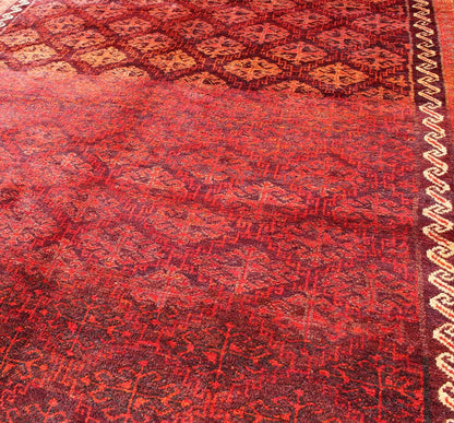 Keivan Woven Arts, H - 1211 - 48, 1950's Semi Antique Tribal Balouchi Rug. This Semi Antique Balouchi rug was woven in 1950 and features a unique all - over design of repeating diamond - shaped motifs in Red , outlined by interconnected latch - hooks. The bo... - Keivan Woven ArtsH - 1211 - 48 - 3778Rug