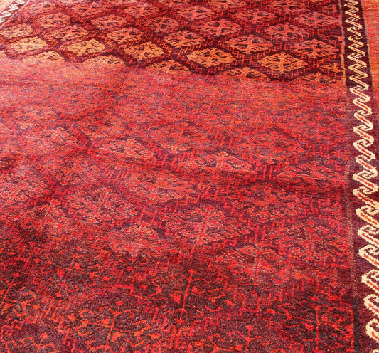 Keivan Woven Arts, H - 1211 - 48, 1950's Semi Antique Tribal Balouchi Rug. This Semi Antique Balouchi rug was woven in 1950 and features a unique all - over design of repeating diamond - shaped motifs in Red , outlined by interconnected latch - hooks. The bo... - Keivan Woven ArtsH - 1211 - 48 - 3778Rug