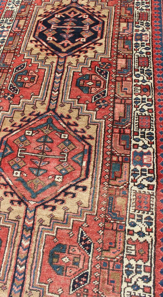 Geometric Medallion design multicolored vintage Persian Karadjeh runner, rug h - 407 - 1, country of origin / type: Iran / Karadjeh, circa 1950. This, handwoven vintage Persian Karadjeh runner features a light camel and soft red - colored field imbued... - Keivan Woven ArtsH - 407 - 1 - 1318Rug