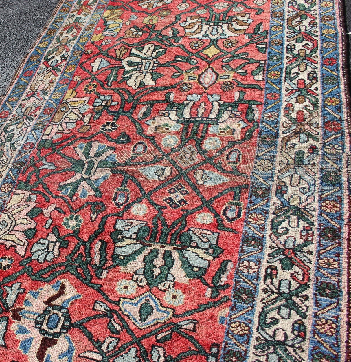Antique Persian Bidjar Rug with Large Floral Motifs in Soft Red, Green & Blue. Soft Red background antique Persian Bidjar rug with floral motifs, rug H - 411 - 12, country of origin / type: Iran / Tabriz, circa 1900 This antique Persian Bidjar ca... - Keivan Woven ArtsH - 411 - 12 - 1251Rug