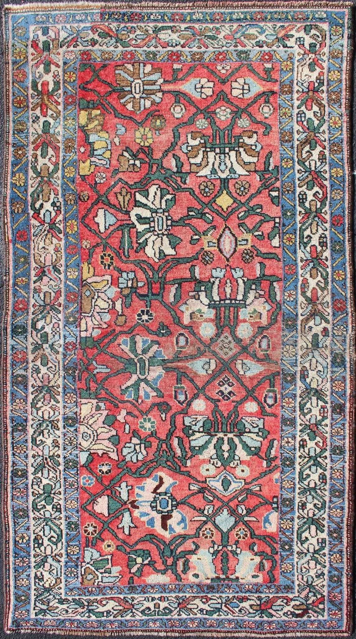 Antique Persian Bidjar Rug with Large Floral Motifs in Soft Red, Green & Blue. Soft Red background antique Persian Bidjar rug with floral motifs, rug H - 411 - 12, country of origin / type: Iran / Tabriz, circa 1900 This antique Persian Bidjar ca... - Keivan Woven ArtsH - 411 - 12 - 1251Rug
