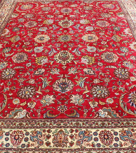 Semi Antique Persian Tabriz Rug with All - Over Blossom Design In Red and Ivory. Keivan Woven Arts / rug H - 411 - 83, country of origin / type: Iran / Tabriz, circa 1960 Measures: 9'6 x 13'1. This Semi Antique Persian Tabriz carpet (circa mid - 20th ce... - Keivan Woven ArtsH - 411 - 83 - 1207Rug