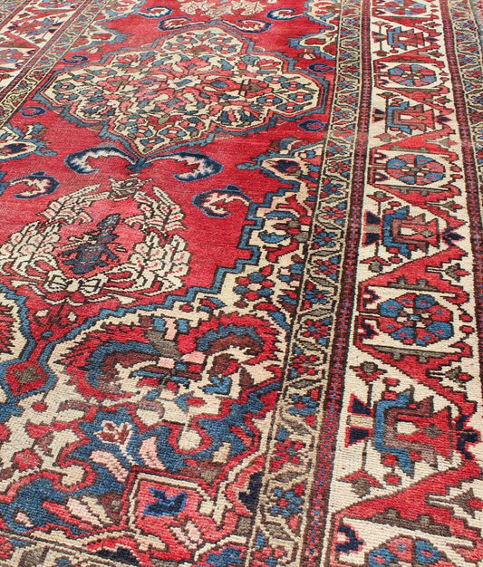 Keivan Woven Arts, H - 508 - 03, 1950's, Vintage Bakhtiari Medallion Rug with Ornate Central Medallion and Rich Red Blue. This vintage multicolored Persian Bakhtiari rug from mid - 20th Century Iran features a red background and central medallion flanked ... - Keivan Woven ArtsH - 508 - 03 - 1255Rug