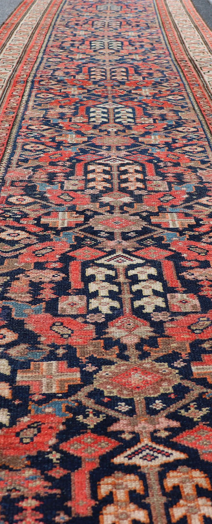Early 20th Century Antique Malayer long Runner Rug in Blue, Orange and Brown Measures: 3'4 x 16'10 Keivan Woven Arts - Rug/H - 510 - 01, antique Malayer, antique Malayer runner. This magnificent antique Malayer runner (circa 1910) bears a be... - Keivan Woven ArtsH - 510 - 01 - 2275Rug