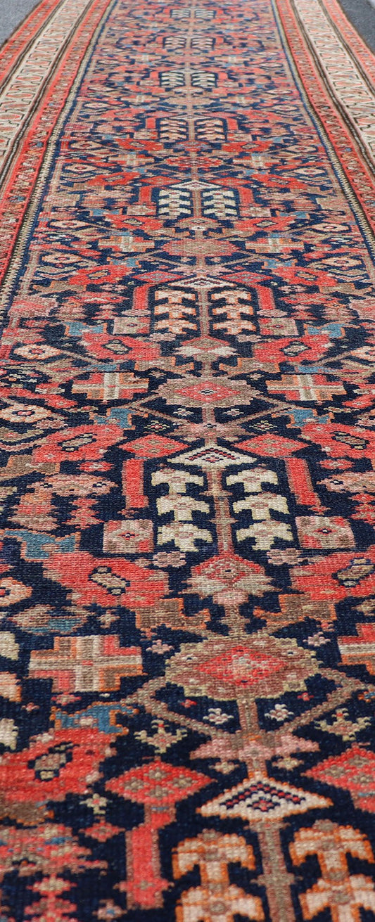 Early 20th Century Antique Malayer long Runner Rug in Blue, Orange and Brown Measures: 3'4 x 16'10 Keivan Woven Arts - Rug/H - 510 - 01, antique Malayer, antique Malayer runner. This magnificent antique Malayer runner (circa 1910) bears a be... - Keivan Woven ArtsH - 510 - 01 - 2275Rug