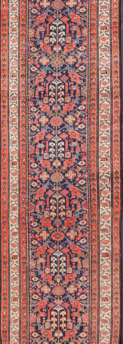 Early 20th Century Antique Malayer long Runner Rug in Blue, Orange and Brown Measures: 3'4 x 16'10 Keivan Woven Arts - Rug/H - 510 - 01, antique Malayer, antique Malayer runner. This magnificent antique Malayer runner (circa 1910) bears a be... - Keivan Woven ArtsH - 510 - 01 - 2275Rug