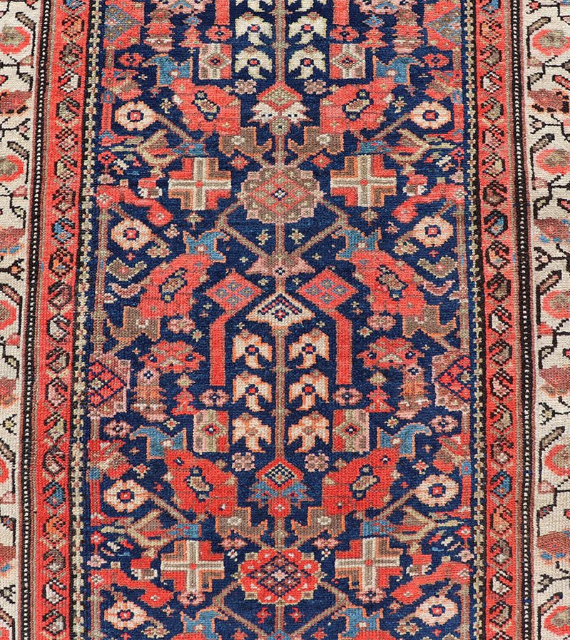 Early 20th Century Antique Malayer long Runner Rug in Blue, Orange and Brown Measures: 3'4 x 16'10 Keivan Woven Arts - Rug/H - 510 - 01, antique Malayer, antique Malayer runner. This magnificent antique Malayer runner (circa 1910) bears a be... - Keivan Woven ArtsH - 510 - 01 - 2275Rug