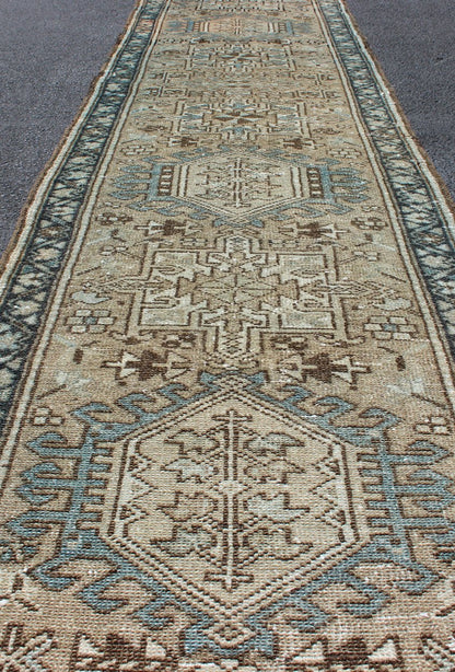 Antique Karadjeh Runner With Geometric Central Medallions in Tan, Blue & Brown. Keivan Woven Arts - Persian Karadjeh narrow runner with multi - medallion design, rug H - 608 - 15, country of origin / type: Heriz, circa mid - 20th century This magnifi... - Keivan Woven ArtsH - 608 - 15 - 1897Rug