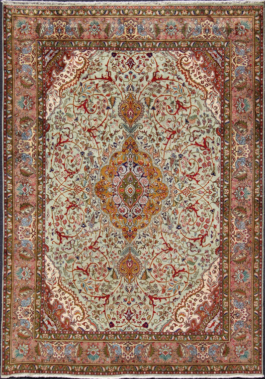 Classic Persian Tabriz Vintage Rug in Celadon Green, Salmon & Multi Colors. Tabriz vintage rug from Persia with a classic medallion Floral design in beautiful celadon green background, salmon border with accent colors of red, yellow or orange and i... - Keivan Woven ArtsH - 609 - 26 - 1213Rug