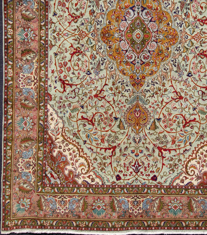 Classic Persian Tabriz Vintage Rug in Celadon Green, Salmon & Multi Colors. Tabriz vintage rug from Persia with a classic medallion Floral design in beautiful celadon green background, salmon border with accent colors of red, yellow or orange and i... - Keivan Woven ArtsH - 609 - 26 - 1213Rug
