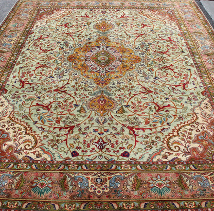 Classic Persian Tabriz Vintage Rug in Celadon Green, Salmon & Multi Colors. Tabriz vintage rug from Persia with a classic medallion Floral design in beautiful celadon green background, salmon border with accent colors of red, yellow or orange and i... - Keivan Woven ArtsH - 609 - 26 - 1213Rug