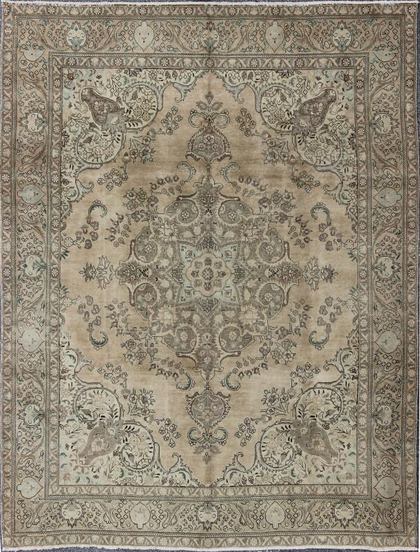 Vintage Muted Persian Tabriz Rug With Large Floral Medallion in Earthy Tones This mid - 20th century, handwoven vintage Persian Tabriz rug features an expansive all - over floral design. A beautifully drawn multi - tiered border surrounds the entirety... - Keivan Woven ArtsH - 702 - 11 - 3732Rug