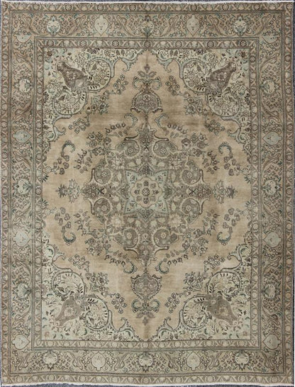 Vintage Muted Persian Tabriz Rug With Large Floral Medallion in Earthy Tones This mid - 20th century, handwoven vintage Persian Tabriz rug features an expansive all - over floral design. A beautifully drawn multi - tiered border surrounds the entirety... - Keivan Woven ArtsH - 702 - 11 - 3732Rug