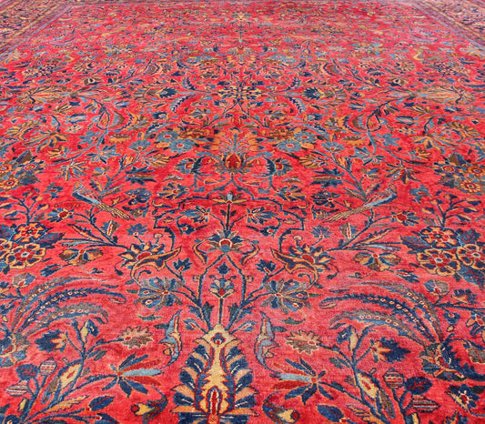 Antique Persian Kashan Rug With a All - Over Design On A Red Field and Blue Border. Keivan Woven Arts / Rug H8 - 0102, country of origin / type: Persian / Kashan, circa early - 20th century. Measures: 10'6'' x 13'10''. This Antique Kashan carpet, feat... - Keivan Woven ArtsH8 - 0102 - 557Rug