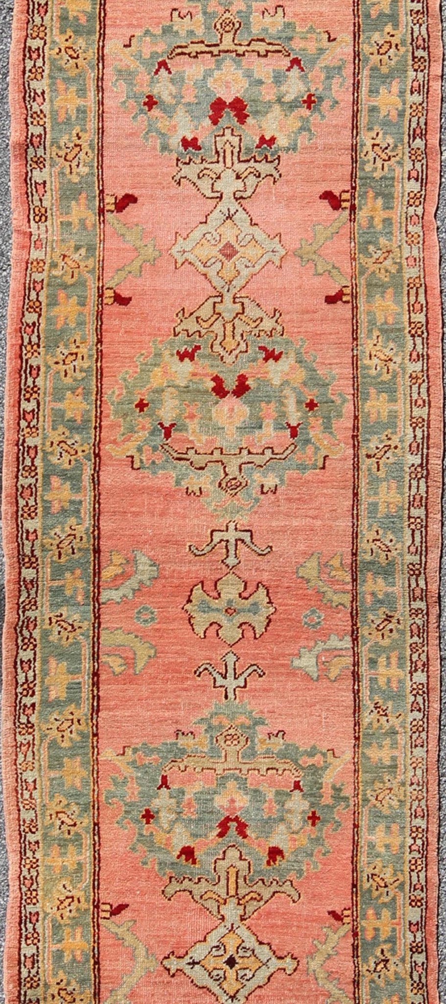 Antique Turkish Oushak Runner This antique Turkish Oushak runner displays beautiful Sub - geometric designs paired with a stunning array of gorgeous pastel colors. The rug is illuminated by an exquisite palette of coral and blue/green with accents... - Keivan Woven ArtsH8 - 0401 - 1396Rug