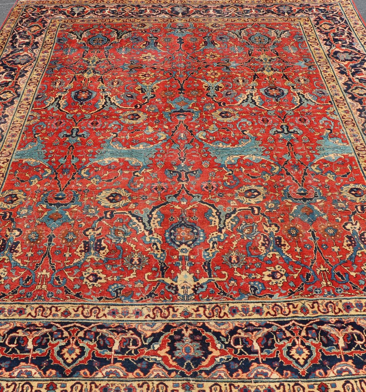 Antique Tabriz Rug with All Over Design in Rust Red, Blue's, Yellow, and L. Blue. Keivan Woven Arts / rug H8 - 0601, country of origin / type: Iran / Tabriz, circa 1910s. Measures: 9'7 x 13'3. This unique and compelling antique Tabriz was w... - Keivan Woven ArtsH8 - 0601 - 3005Rug