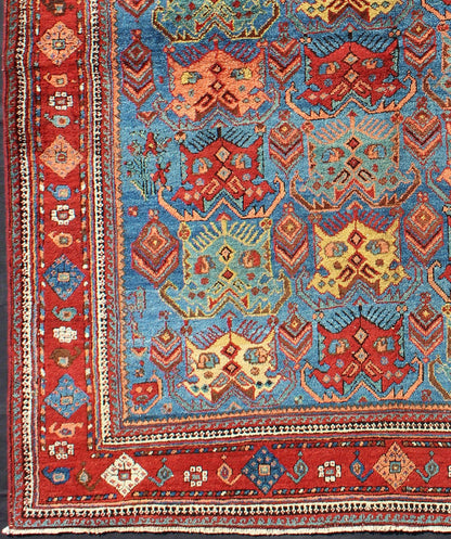 Square shape Antique Persian Afshar Rug in Blue Background, Terracotta Red Border, Light Green, vivid yellow, salmon and ivory. Bold geometry, rich symbolism, and vivid singular coloration contribute to the beauty of this stunning piece. Keivan Woven A... - Keivan Woven ArtsH8 - 1103 - 1568Rug