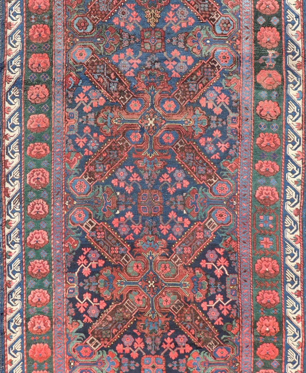 Antique Caucasian 19th Century Seychour Rug in Blue, Green, Brown & Multi Colors. Set on an indigo background this antique 19th Century Seychour Caucasian rug features four intricate medallions composed of delightful rich colors. The entire piece i... - Keivan Woven ArtsH8 - 1105 - 2633Rug