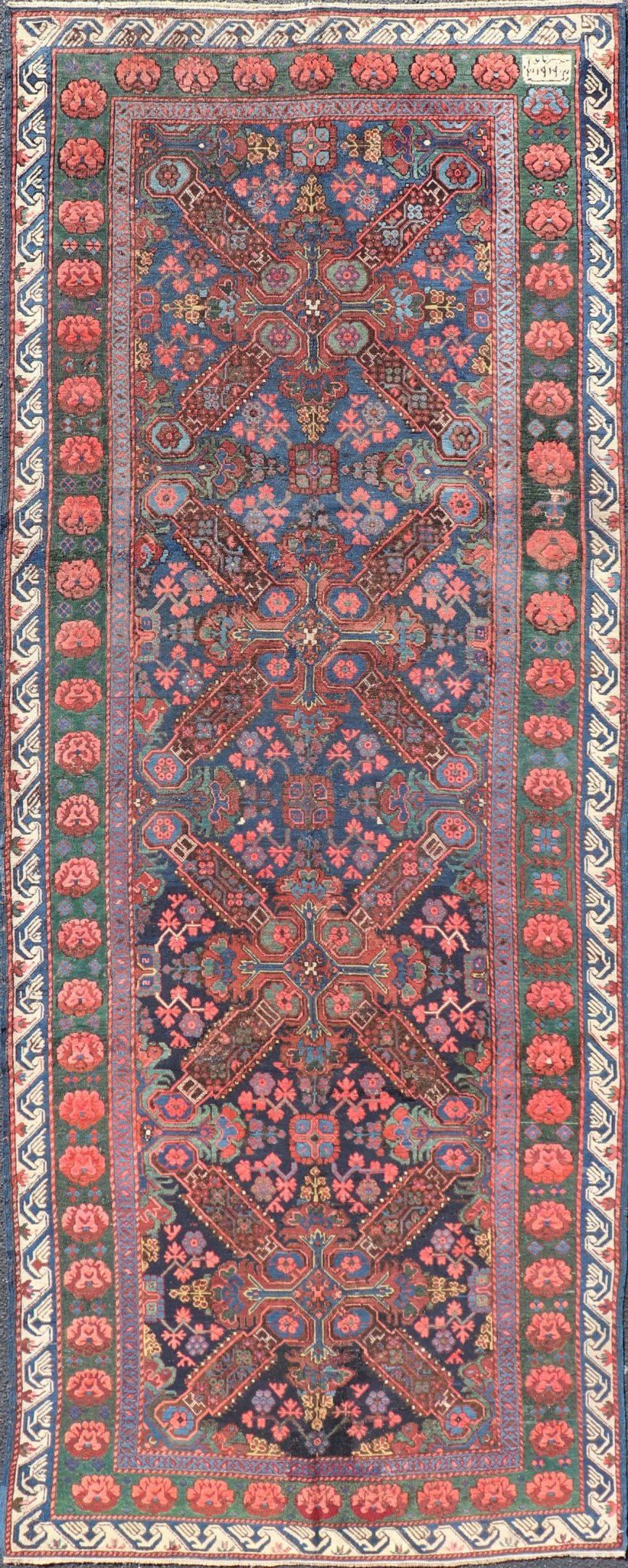 Antique Caucasian 19th Century Seychour Rug in Blue, Green, Brown & Multi Colors. Set on an indigo background this antique 19th Century Seychour Caucasian rug features four intricate medallions composed of delightful rich colors. The entire piece i... - Keivan Woven ArtsH8 - 1105 - 2633Rug