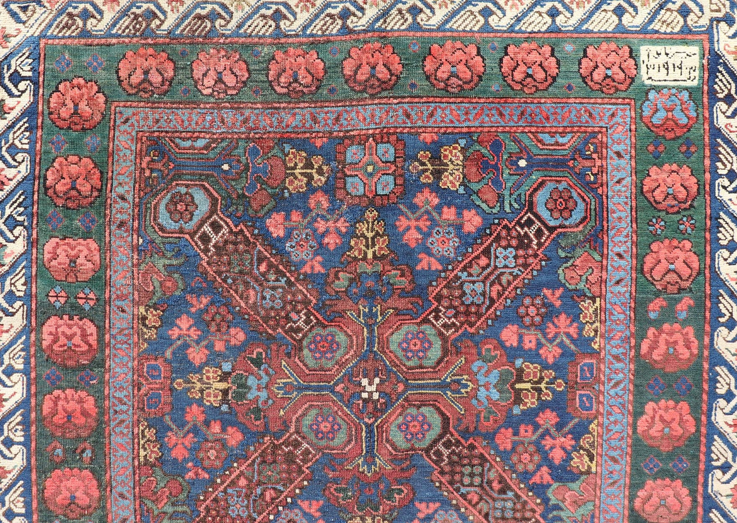 Antique Caucasian 19th Century Seychour Rug in Blue, Green, Brown & Multi Colors. Set on an indigo background this antique 19th Century Seychour Caucasian rug features four intricate medallions composed of delightful rich colors. The entire piece i... - Keivan Woven ArtsH8 - 1105 - 2633Rug