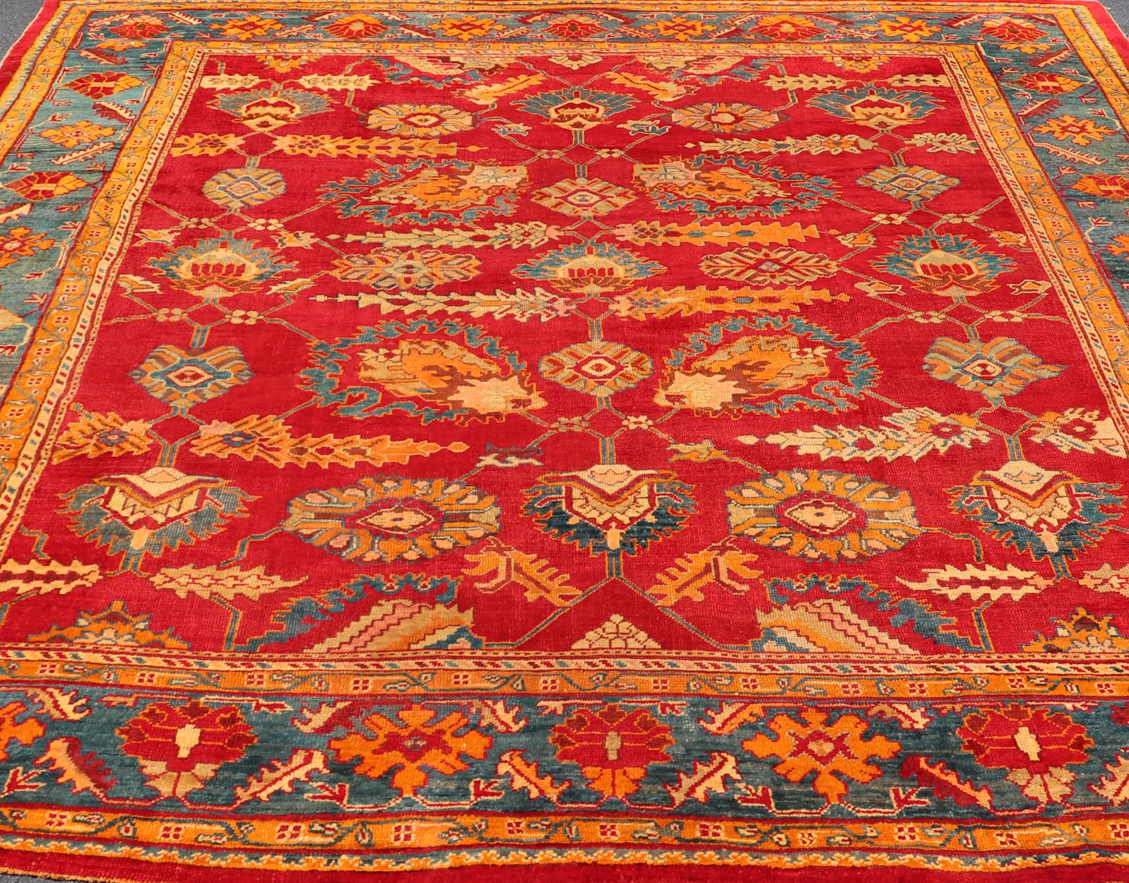 Traditional Design Antique Turkish Oushak Rug in Red, Blue and Marigold. Keivan Woven Arts / Rug / HAS - 3326 / country of origin / type: Turkey / Oushak, circa 1910. Measures: 11'7 x 12'5. This brilliant antique Turkish Oushak rug displays a glor... - Keivan Woven ArtsHAS - 3326 - 4170Rug