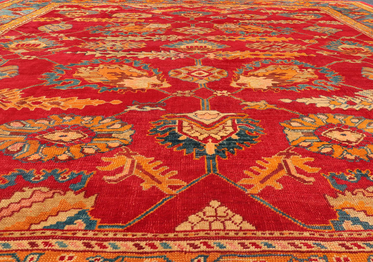 Traditional Design Antique Turkish Oushak Rug in Red, Blue and Marigold. Keivan Woven Arts / Rug / HAS - 3326 / country of origin / type: Turkey / Oushak, circa 1910. Measures: 11'7 x 12'5. This brilliant antique Turkish Oushak rug displays a glor... - Keivan Woven ArtsHAS - 3326 - 4170Rug