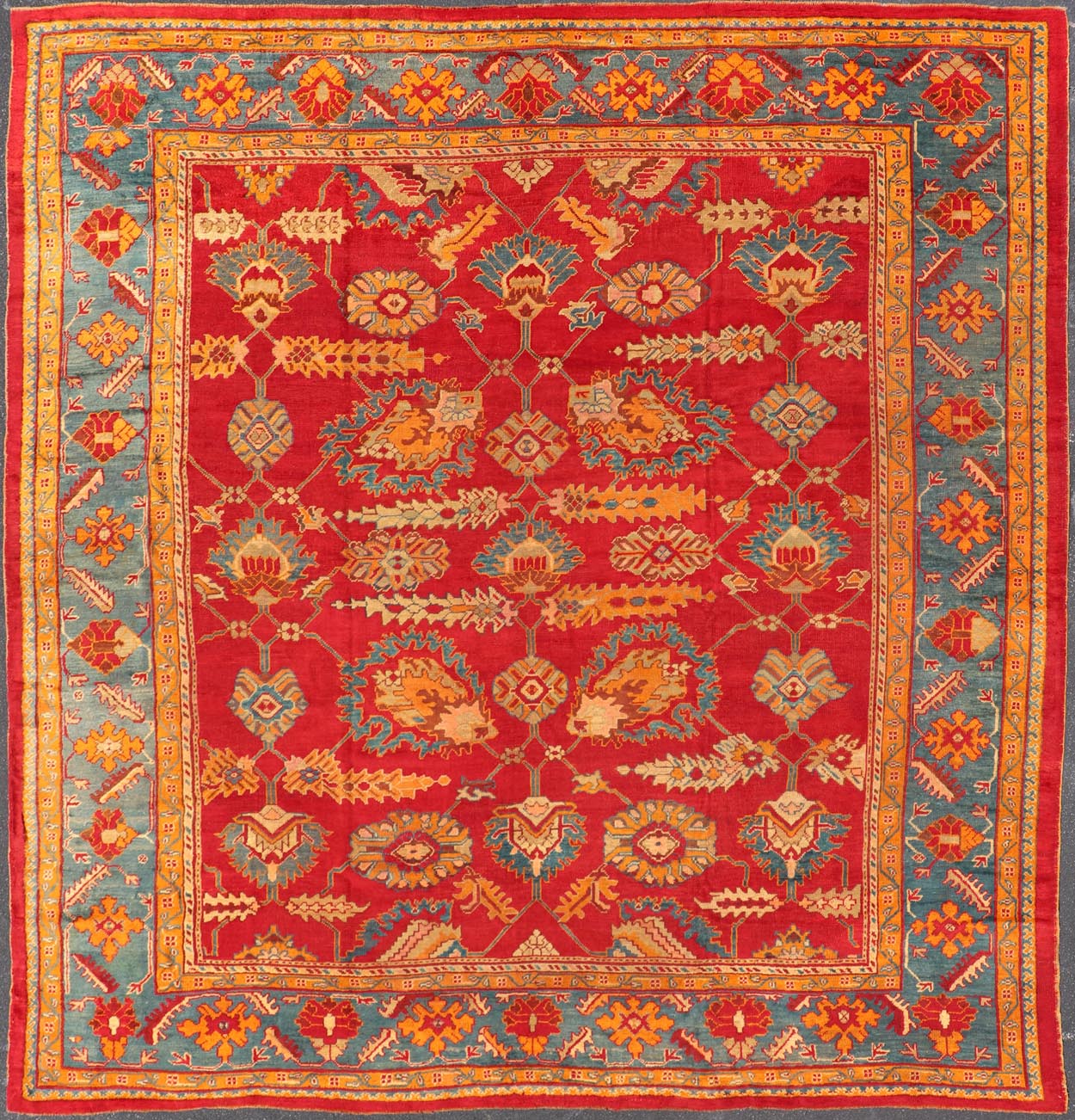 Traditional Design Antique Turkish Oushak Rug in Red, Blue and Marigold. Keivan Woven Arts / Rug / HAS - 3326 / country of origin / type: Turkey / Oushak, circa 1910. Measures: 11'7 x 12'5. This brilliant antique Turkish Oushak rug displays a glor... - Keivan Woven ArtsHAS - 3326 - 4170
