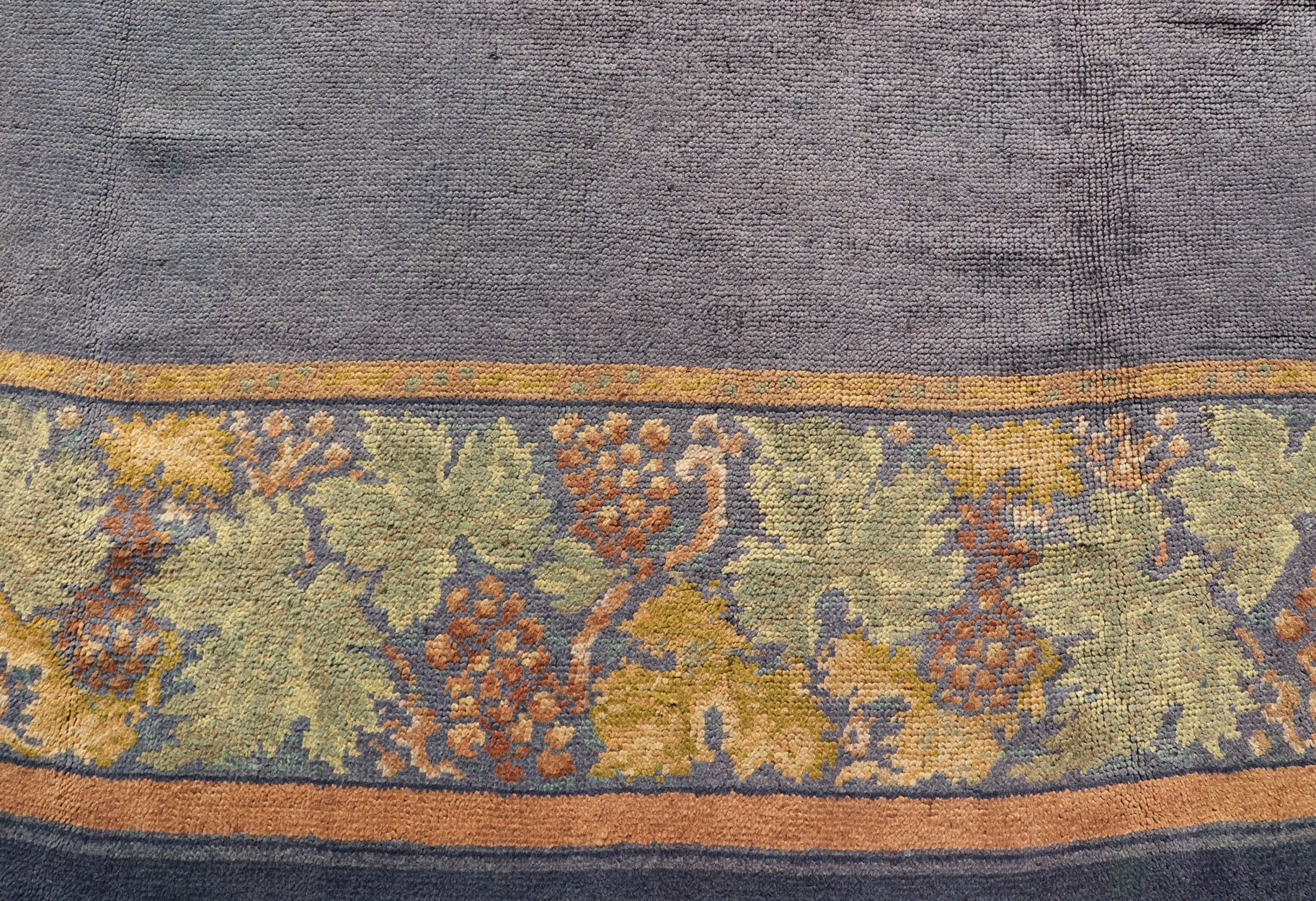 Antique Donegal carpet from Ireland in solid Purple Background and Floral Border in a near square size. Keivan Woven Arts / Rug/ HAS - 3327. Donegal rug, Antique Donegal. Measures: 10'6 x 10'10. Made in Ireland, this beautifully crafted Donegal ca... - Keivan Woven ArtsHAS - 3327 - 4176Rug