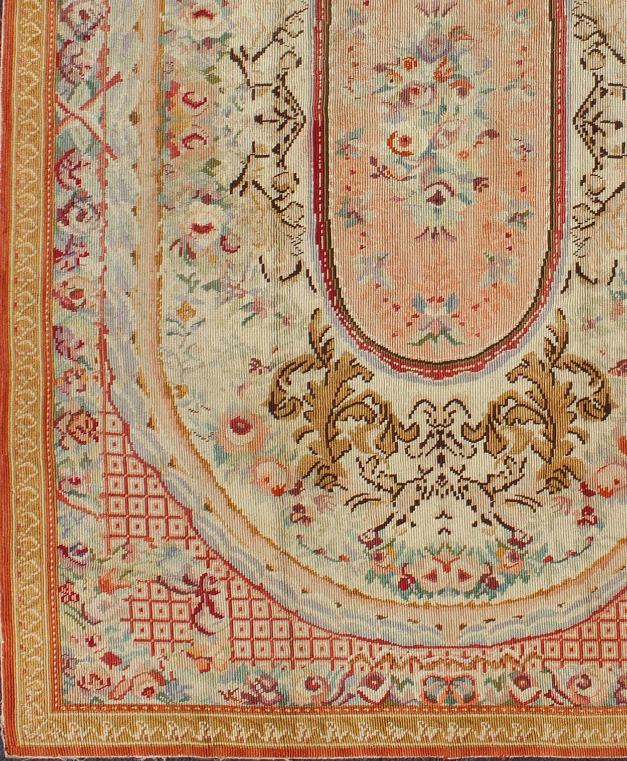 Antique English Needlepoint with Floral Design and Central Floral Medallion. Antique English Needlepoint with Floral Design and Central Floral Medallion. Rug/I - 0201, French Aubusson, Needlepoint Aubusson. This colorful antique English n... - Keivan Woven ArtsI - 0201 - 1987Rug