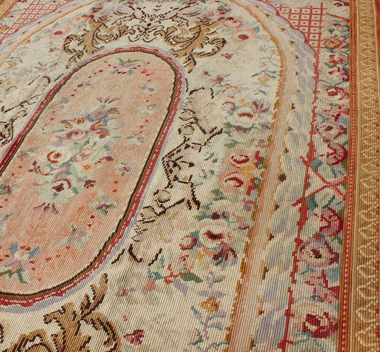 Antique English Needlepoint with Floral Design and Central Floral Medallion. Antique English Needlepoint with Floral Design and Central Floral Medallion. Rug/I - 0201, French Aubusson, Needlepoint Aubusson. This colorful antique English n... - Keivan Woven ArtsI - 0201 - 1987Rug