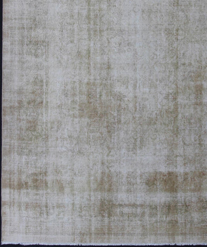 Vintage Distressed Amritsar with All Over Design in Light Green kwarugs This rug was woven in India during the second quarter of 20th century. The acidic yellow/green tones and neutral hues of this Indian Amritsar rug play off each other amidst ... - Keivan Woven ArtsI - 0401 - 1917Rug