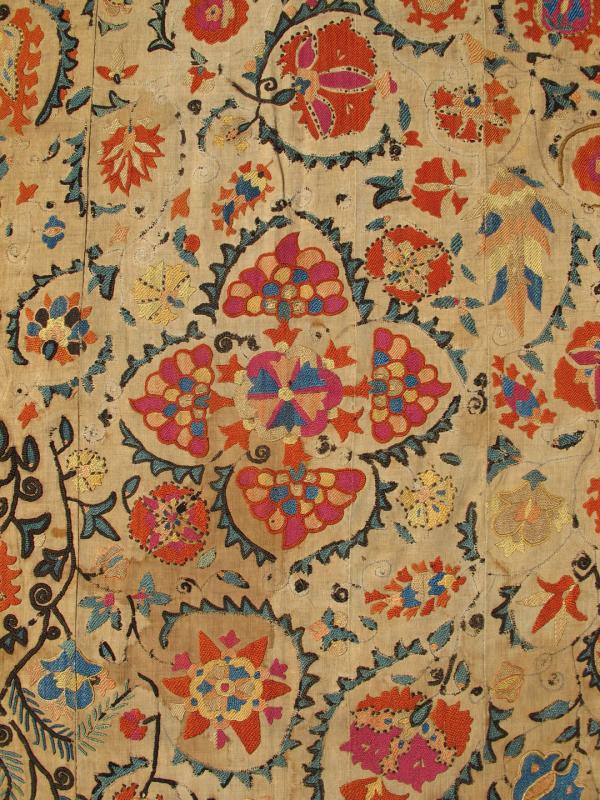 Antique Uzbekistan Suzani Embroidery A true jewel of Uzbekistani embroidery, this magnificent antique Suzani is illuminated with a dazzling display of bright colors and exotic design. Because of their exquisite needlework, the highly desirable S... - Keivan Woven ArtsI - 1002 - 1578Rug