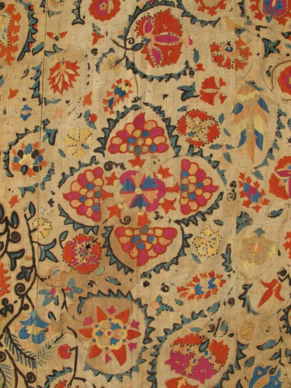 Antique Uzbekistan Suzani Embroidery A true jewel of Uzbekistani embroidery, this magnificent antique Suzani is illuminated with a dazzling display of bright colors and exotic design. Because of their exquisite needlework, the highly desirable S... - Keivan Woven ArtsI - 1002 - 1578Rug