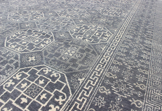 Antique Reproduction Indian Khotan Rug. Measures: 7'11 x 9'10. This attractive reproduction Khotan rug is a spectacular testament to the complexity of Turkestan design. The dark blue central field plays host to a stunning all - over display of inte... - Keivan Woven ArtsIN - BAM - 59077 - 8283