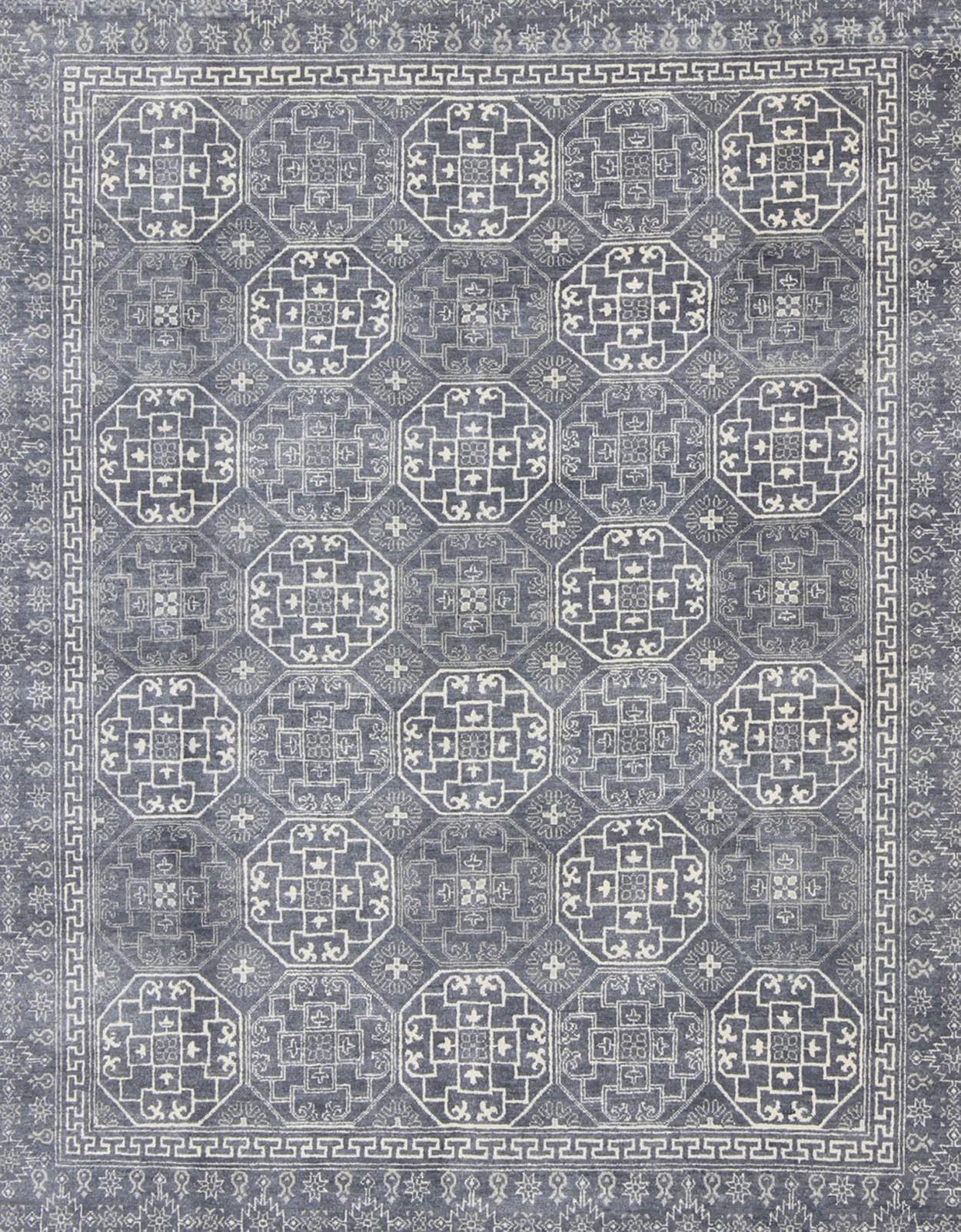 Antique Reproduction Indian Khotan Rug. Measures: 7'11 x 9'10. This attractive reproduction Khotan rug is a spectacular testament to the complexity of Turkestan design. The dark blue central field plays host to a stunning all - over display of inte... - Keivan Woven ArtsIN - BAM - 59077 - 8283Rug